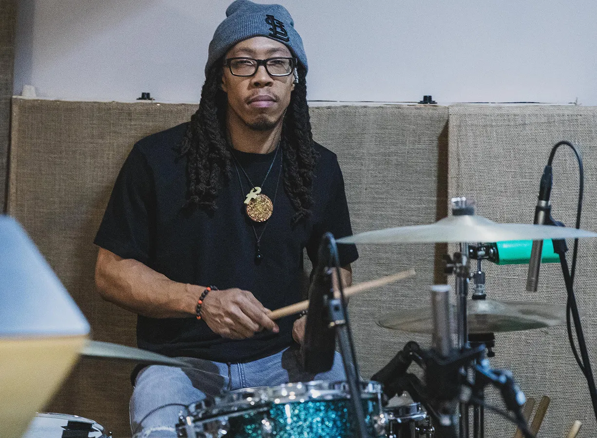 Phonic Pressure's drummer behind the kit in the studio