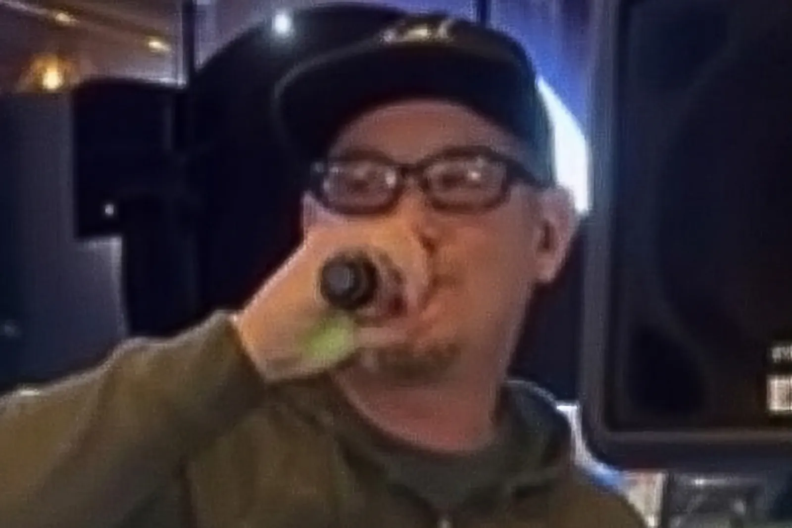 Phonic Pressure's vocalist singing into a microphone